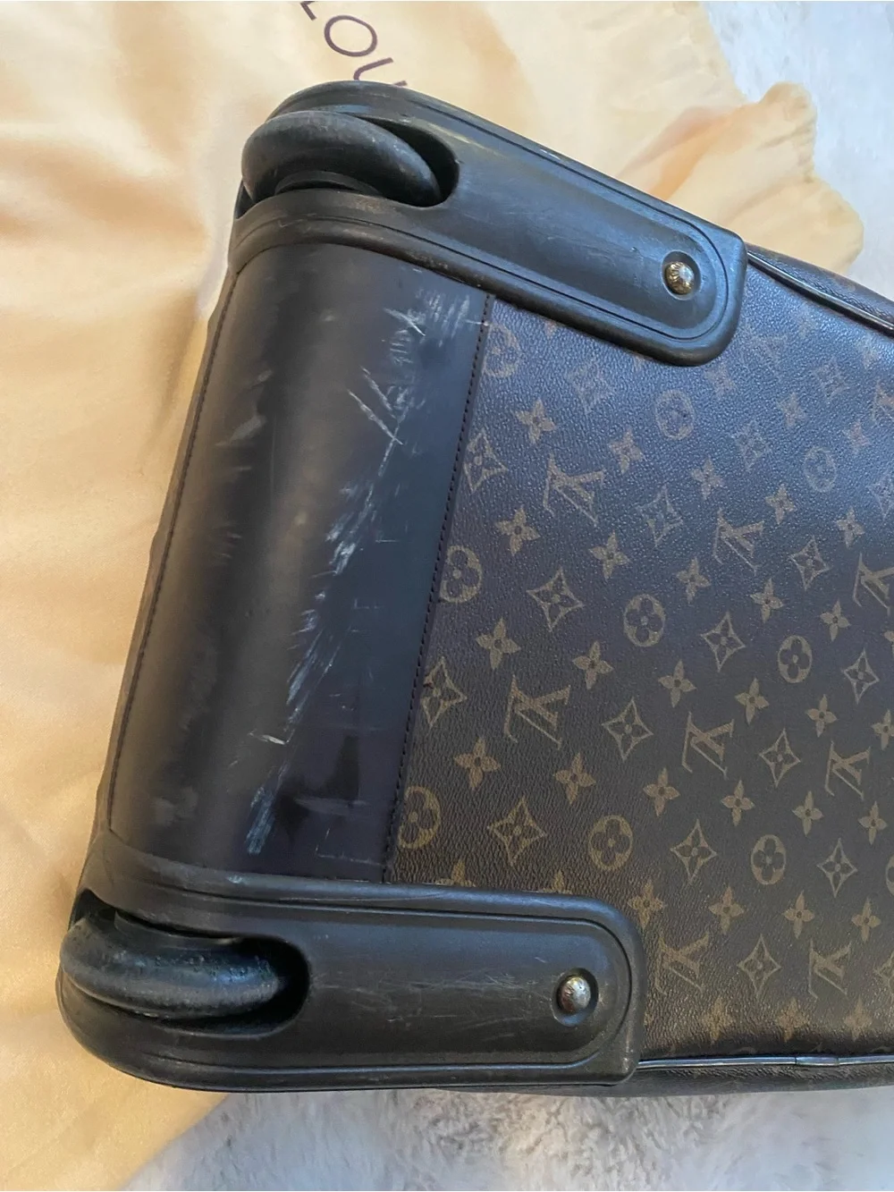 Louis Vuitton Monogram Canvas rolling Travel Bag with Natural Vachetta Trim